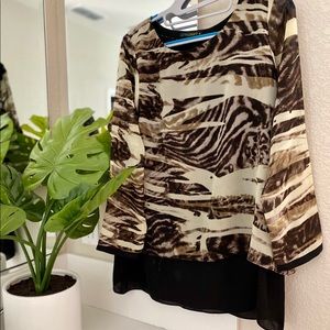 A light chiffon like material top.